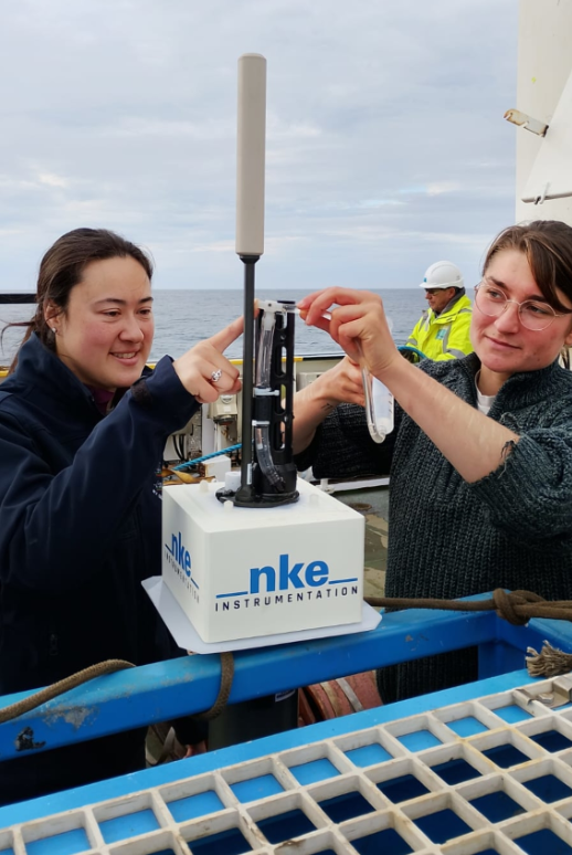Christine Loughlin (Marine Institute, left) and Anneke Sperling (SAMS, Right) work together to deploy a classic Argo float. (Credit: Marine Institute)